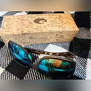 Woman’s Costa Polarized Sunglasses.